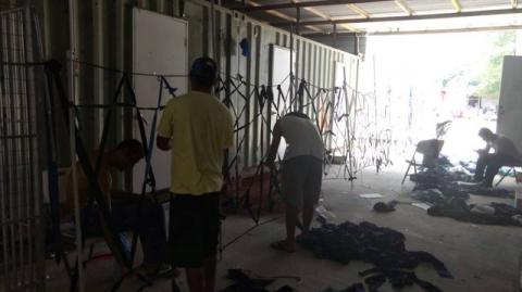 Asylum seekers build a makeshift fence with fabric, at a detention centre on Manus Island, Papua New Guinea, in this picture obtained from social media on November 11, 2017. PHOTO BY REUTERS/Social Media