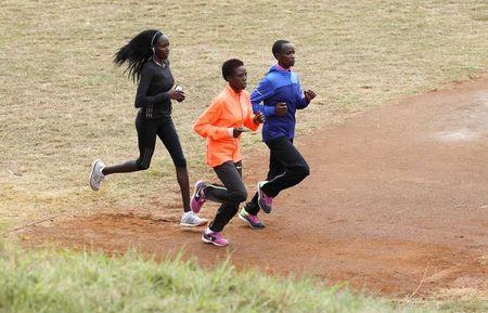 Kenyan athletes run during a training session in Nairobi, ahead of the 15th IAAF World Championships in Beijing, August 5, 2015. PHOTO BY REUTERS/Thomas Mukoya