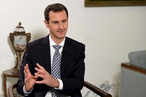 Syria's President Bashar al-Assad speaks during an interview with Spanish newspaper El Pais in Damascus, in this handout picture provided by SANA on February 20, 2016. PHOTO BY REUTERS/SANA/Handout via Reuters