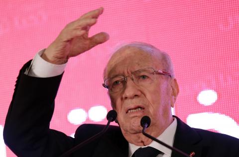 Beji Caid Essebsi, leader of Tunisia's secular Nidaa Tounes party and a presidential candidate, casts his vote at a polling station in Tunis, November 23, 2014. PHOTO BY REUTERS/Zoubeir Souissi