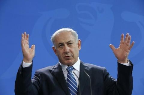 Israeli Prime Minister Benjamin Netanyahu gestures as he addresses a news conference at the Chancellery in Berlin, Germany, February 16, 2016. PHOTO BY REUTERS/Fabrizio Bensch