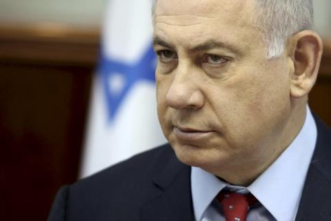 Israeli Prime Minister Benjamin Netanyahu looks on as he opens the weekly cabinet meeting in Jerusalem, April 10, 2016. PHOTO BY REUTERS/Gali Tibbon