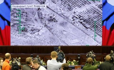 Journalists attend a briefing at the headquarters of Russia's defence ministry in Moscow, Russia, December 25, 2015. PHOTO BY REUTERS/Maxim Zmeyev