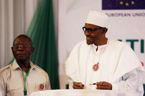 Nigeria's President Muhammadu Buhari looks on during a signature of a commitment to good behaviour in the February 2019 elections, in Abuja, Nigeria, December 11, 2018. PHOTO BY REUTERS/Afolabi Sotunde