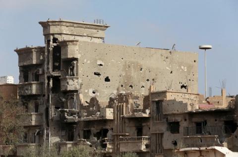 Buildings damaged during clashes between military forces loyal to Libya's eastern government and the Shura Council of Libyan Revolutionaries, an alliance of former anti-Gaddafi rebels who have joined forces with the Islamist group Ansar al-Sharia in Benghazi, Libya March 12, 2016. PHOTO BY REUTERS/Esam Omran Al-Fetori