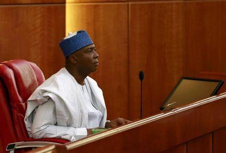 Senator Bukola Saraki looks on after being elected as the senate president of the 8th Nigeria Assembly in Abuja, Nigeria, June 9, 2015. PHOTO BY REUTERS/Afolabi Sotunde