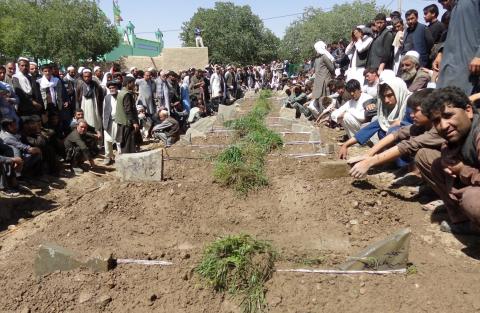 Afghans take part in a burial ceremony for the victims of a suicide bombing attack that took place in a Shi'ite mosque in Gardez, Paktia province, Afghanistan, August 4, 2018. PHOTO BY REUTERS/Stringer