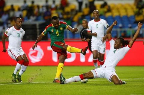 Cameroon's Jacques Zoua Daogari is tackled by Burkina Faso's Bakery Kone in the African Cup of Nations in Stade de l'ball Soccer, Libreville, Gabon, January, 14, 2017. PHOTO BY REUTERS/Mike Hutchings