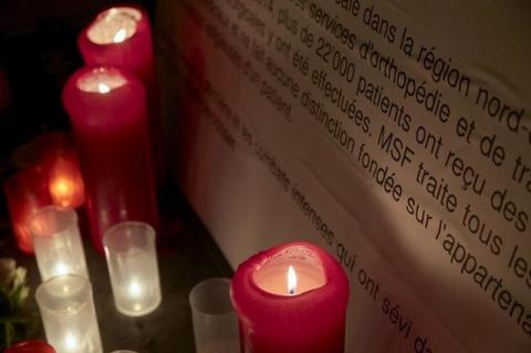 Candles are outside the Medecins Sans Frontieres (MSF) headquarters in Geneva, Switzerland, October 7, 2015. PHOTO BY REUTERS/Denis Balibouse
