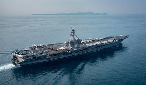 The aircraft carrier USS Carl Vinson (CVN 70) transits the Indian Ocean, April 15, 2017. Picture taken April 15, 2017. U.S. Navy photo by Mass Communication Specialist 3rd Class Matt Brown/Handout via REUTERS