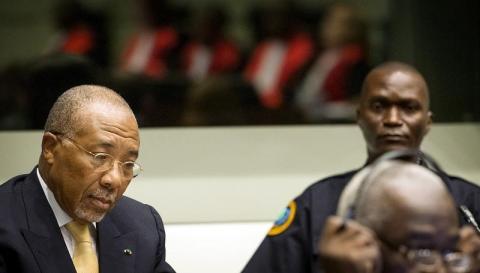 Former Liberian President Charles Taylor appears in court at the Special Court for Sierra Leone for his appeal judgment at The Hague, September 26, 2013. PHOTO BY REUTERS/Koen van Weel