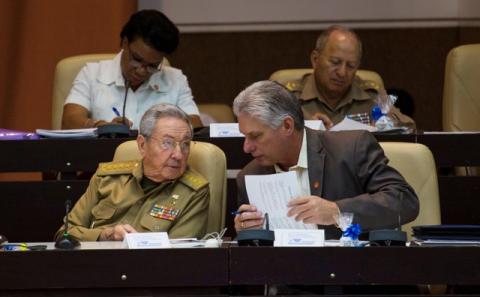 Cuba's President Raul Castro (L) chats with Cuba's First Vice-President Miguel Diaz-Canel during the National Assembly in Havana, Cuba, December 21, 2017. PHOTO BY REUTERS/Irene Perez/Courtesy of Cubadebate