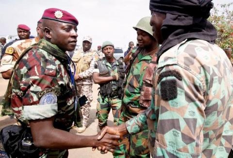 Lieutenant-Colonel Cherif Ousmane greets mutinous soldiers at the airport in Bouake, Ivory Coast, January 13, 2017. PHOTO BY REUTERS/Thierry Gouegnon