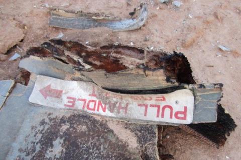 Debris is seen at the crash site of Air Algerie flight AH5017 near the northern Mali town of Gossi, July 24, 2014. PHOTO BY REUTERS/Burkina Faso Military