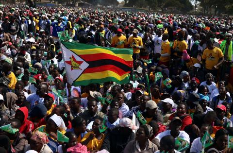Supporters of President Emmerson Mnangagwa gather at an election rally in Marondera, Zimbabwe, July 21, 2018. PHOTO BY REUTERS/Philimon Bulawayo