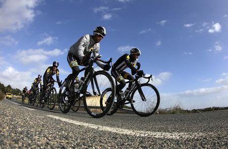 Eritrean cyclist Natnael Berhane (L) and Adrien Niyonshuti of Rwanda lead fellow MTN-Qhubeka team team members during a training ride on the Spanish island of Mallorca, January 24, 2015. PHOTO BY REUTERS/Enrique Calvo