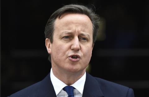 Britain's Prime Minister David Cameron speaks as he returns to Number 10 Downing Street, after meeting with Queen Elizabeth at Buckingham Palace in central London, March 30, 2015. PHOTO BY REUTERS/Toby Melville