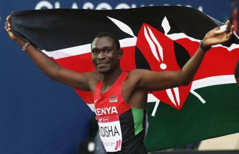 David Rudisha of Kenya celebrates after winning the silver medal in the men's 800m final at the 2014 Commonwealth Games in Glasgow, Scotland, July 31, 2014. PHOTO BY REUTERS/Suzanne Plunkett 
