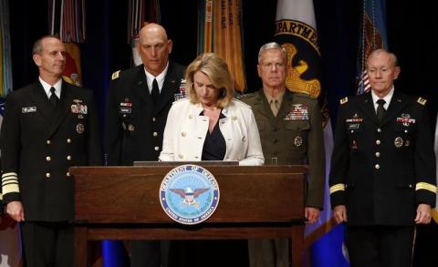Deborah Lee James, Secretary of the Air Force, signs the Department of Defense Human Goals Charter at the Pentagon in Washington