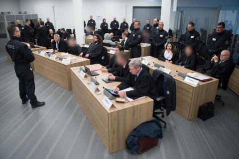 Defendants of the the far-right group "Gruppe Freital" wait for their verdict in a courtroom in Dresden, Germany, March 7, 2018. PHOTO BY REUTERS/Sebastian Kahnert