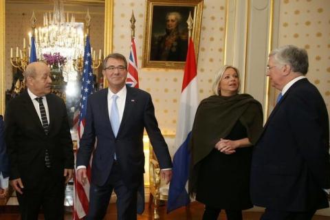 From L-R, French Defence Minister Jean-Yves Le Drian, U.S. Defense Secretary Ash Carter, Netherlands Defence Minister Jeanine Hennis-Plasschaert and Britain's Defence Secretary Michael Fallon gather for a family photo at the French Defence Ministry in Paris, France, January 20, 2016. PHOTO BY REUTERS/Jacky Naegelen