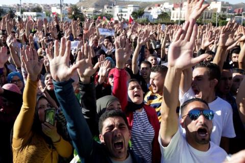 Thousands of Moroccans shout slogans during a demonstration in the northern town of Al-Hoceima, seven months after a fishmonger was crushed to death inside a garbage truck as he tried to retrieve fish confiscated by the police, in Al-Hoceima, Morocco, May 18, 2017. PHOTO BY REUTERS/Youssef Boudlal