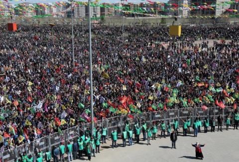 Demonstrators gather to celebrate the spring festival of Newroz in the Kurdish-dominated southeastern city of Diyarbakir, Turkey, March 21, 2016. PHOTO BY REUTERS/Sertac Kayar