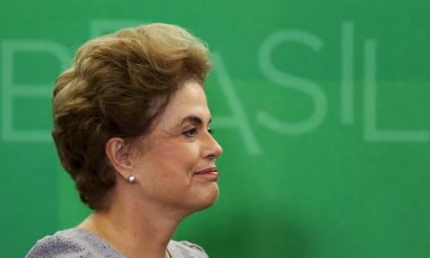 Brazil's President Dilma Rousseff smiles as she attends a meeting with jurists at Planalto Palace in Brasilia, Brazil, March 22, 2016. PHOTO BY REUTERS/Adriano Machado