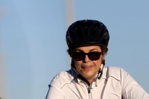 Brazil's suspended President Dilma Rousseff rides her bicycle near the Alvorada Palace in Brasilia, Brazil, August 3, 2016. PHOTO BY REUTERS/Adriano Machado