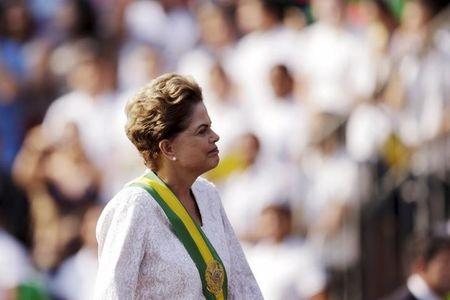 Brazil's President Dilma Rousseff stands in a vehicle during a civic-military parade to commemorate Brazil's Independence Day in Brasilia, Brazil, September 7, 2015. PHOTO BY REUTERS/Ueslei Marcelino