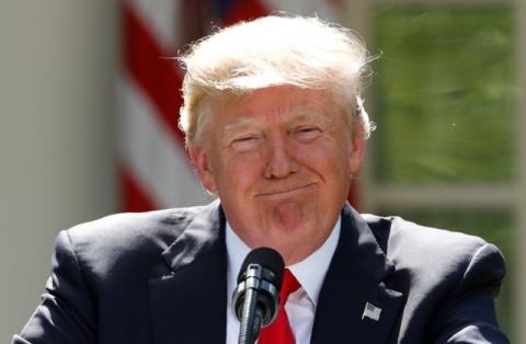 U.S. President Donald Trump pauses as he announces his decision that the United States will withdraw from the landmark Paris Climate Agreement, in the Rose Garden of the White House in Washington, U.S., June 1, 2017. PHOTO BY REUTERS/Kevin Lamarque