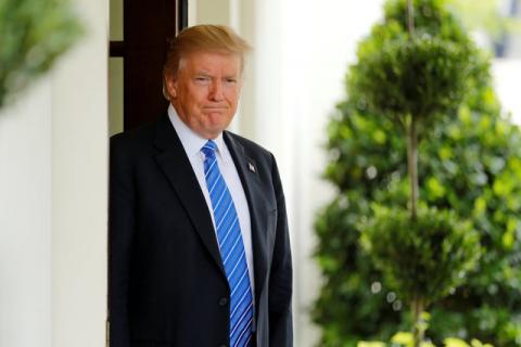 U.S. President Donald Trump waits to greet Malaysia's Prime Minister Najib Razak at the White House in Washington, U.S., September 12, 2017. PHOTO BY REUTERS/Jonathan Ernst