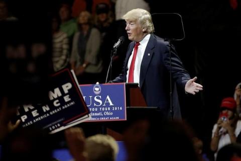 U.S. President-elect Donald Trump speaks at a USA Thank You Tour event at U.S. Bank Arena in Cincinnati, Ohio, U.S., December 1, 2016. PHOTO BY REUTERS/Mike Segar