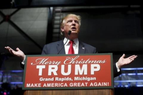 U.S. Republican presidential candidate Donald Trump addresses the crowd during a campaign rally in Grand Rapids, Michigan, December 21, 2015. PHOTO BY REUTERS/Rebecca Cook