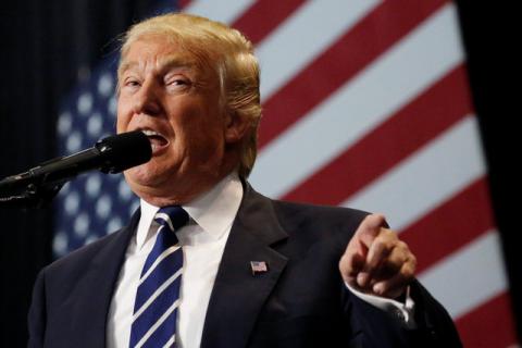 U.S. President-elect Donald Trump speaks at the USA Thank You Tour event at the Wisconsin State Fair Exposition Center in West Allis, Wisconsin, U.S., December 13, 2016. PHOTO BY REUTERS/Shannon Stapleton