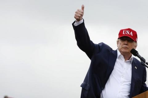 U.S. President-elect Donald Trump gestures as he speaks during a USA Thank You Tour event in Mobile, Alabama, U.S., December 17, 2016. PHOTO BY REUTERS/Lucas Jackson