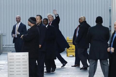 U.S. President-elect Donald Trump (C) exits One World Trade Center following a meeting in Manhattan, New York City, U.S., January 6, 2017. PHOTO BY REUTERS/Lucas Jackson