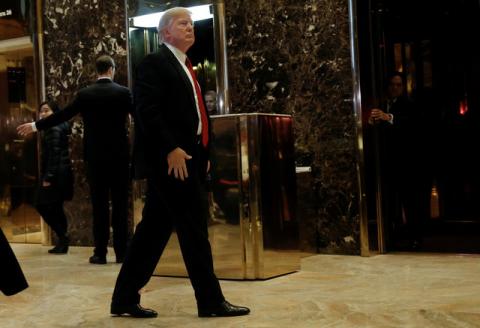 U.S.President-elect Donald Trump makes an appearance in the lobby at Trump Tower in New York, U.S., January 13, 2017. PHOTO BY REUTERS/Mike Segar