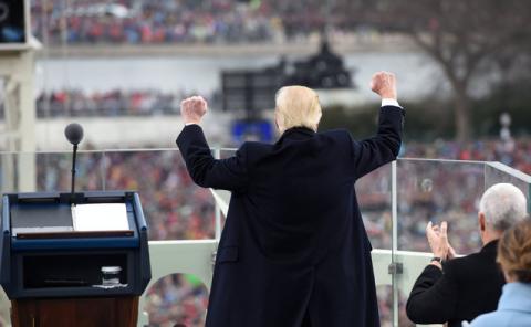 U.S. President Donald Trump celebrates after his speech during the Presidential Inauguration at the US Capitol in Washington, D.C., U.S., January 20, 2017. PHOTO BY REUTERS/Saul Loeb