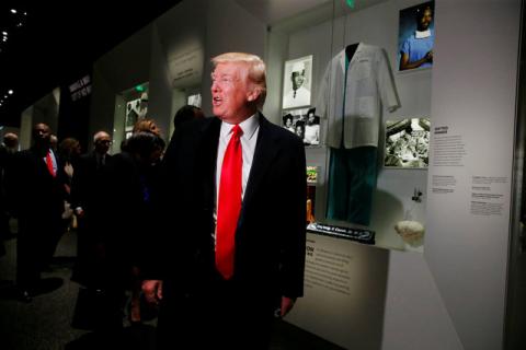 U.S. President Donald Trump pauses at the Dr. Ben Carson exhibit at the National Museum of African American History and Culture in Washington, U.S., February 21, 2017. PHOTO BY REUTERS/Jonathan Ernst