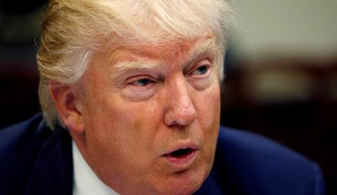 U.S. President Donald Trump speaks during a "strategic initiatives" lunch at the White House in Washington, U.S., February 22, 2017. PHOTO BY REUTERS/Kevin Lamarque