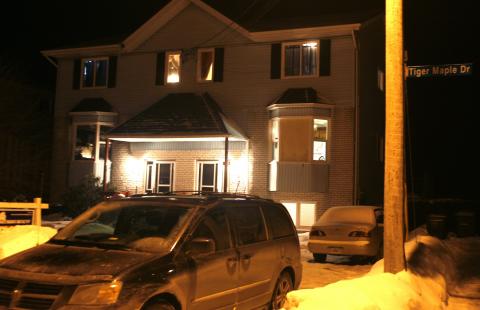 A duplex home where a 19-year-old man was found dead is shown in Timberlea, Nova Scotia, February 13, 2015. PHOTO BY REUTERS/Darren Pittman