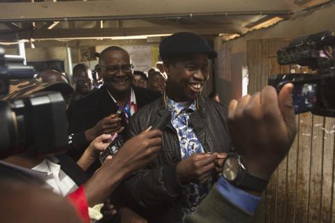 Patriotic Front (PF) Presidential candidate Edgar Lungu leaves after casting his ballot at a voting station in John Howard township in Lusaka, January 20, 2015. PHOTO BY REUTERS/Rogan Ward