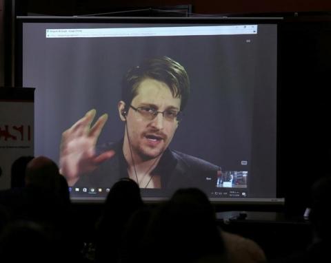 Edward Snowden speaks via video link during a conference at University of Buenos Aires Law School, Argentina, November 14, 2016. PHOTO BY REUTERS/Marcos Brindicci