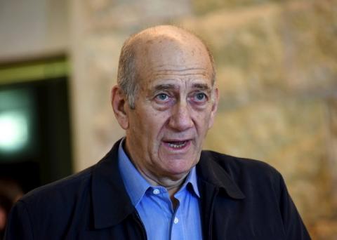 Former Israeli Prime Minister Ehud Olmert speaks to the media after a hearing at the Supreme Court in Jerusalem, December 29, 2015. PHOTO BY REUTERS/Debbie Hill