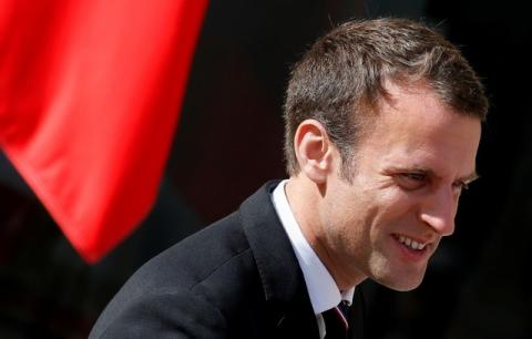 French President Emmanuel Macron reacts after a meeting and family photo with the International Olympic Committee (IOC) Evaluation Commission at the Elysee Place in Paris, France, May 16, 2017. PHOTO BY REUTERS/Gonzalo Fuentes