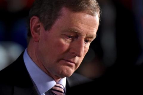 Irish Prime Minister Enda Kenny pauses before speaking to the media at the general election count centre in Castlebar, Ireland, February 27, 2016. PHOTO BY REUTERS/Clodagh Kilcoyne