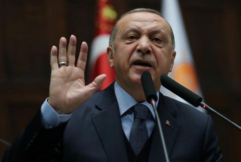 Turkish President Tayyip Erdogan addresses members of parliament from his ruling AK Party (AKP) during a meeting at the Turkish parliament in Ankara, Turkey, January 8, 2019. PHOTO BY REUTERS/Umit Bektas