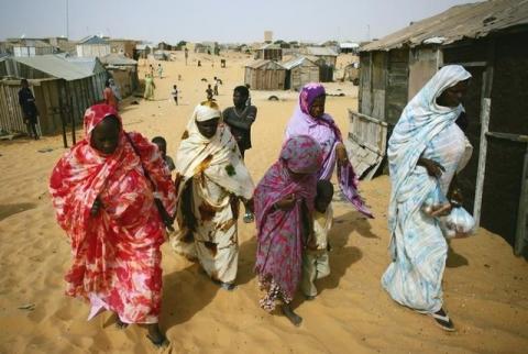 Mauritanians ex-slaves walk in a suburb outside Mauritania's capital Nouakchott, file. PHOTO BY REUTERS/Rafael Marchante