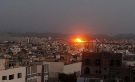 An explosion is seen after a Saudi-led air strike hit the weapons depots at a Houthi-controlled military base in Yemen's capital Sanaa, September 12, 2015. PHOTO BY REUTERS/Mohamed al-Sayaghi